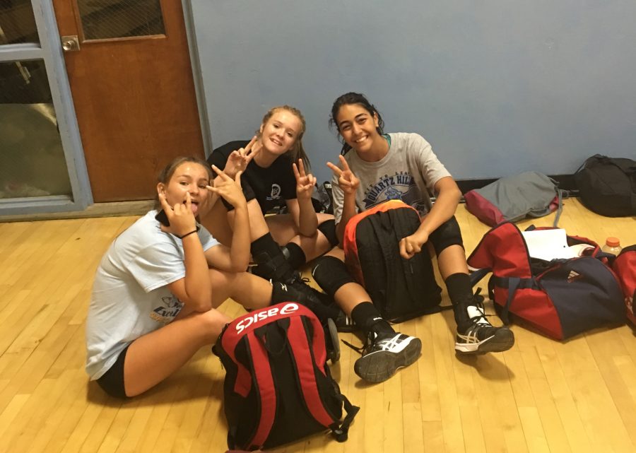 Volleyball players Dorsa Bahmani and friends pose for a picture.