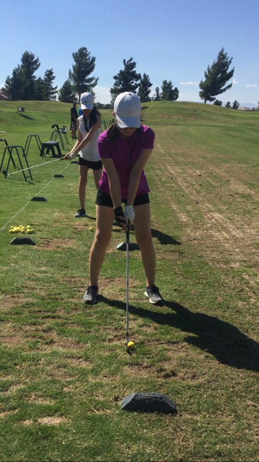 Julia Ban playing golf